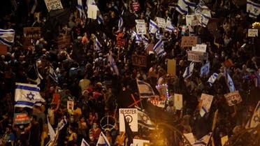 Thousands protest against Israel's Prime Minister Benjamin Netanyahu in front of his official residence in Jerusalem, on August 8, 2020. (AP)