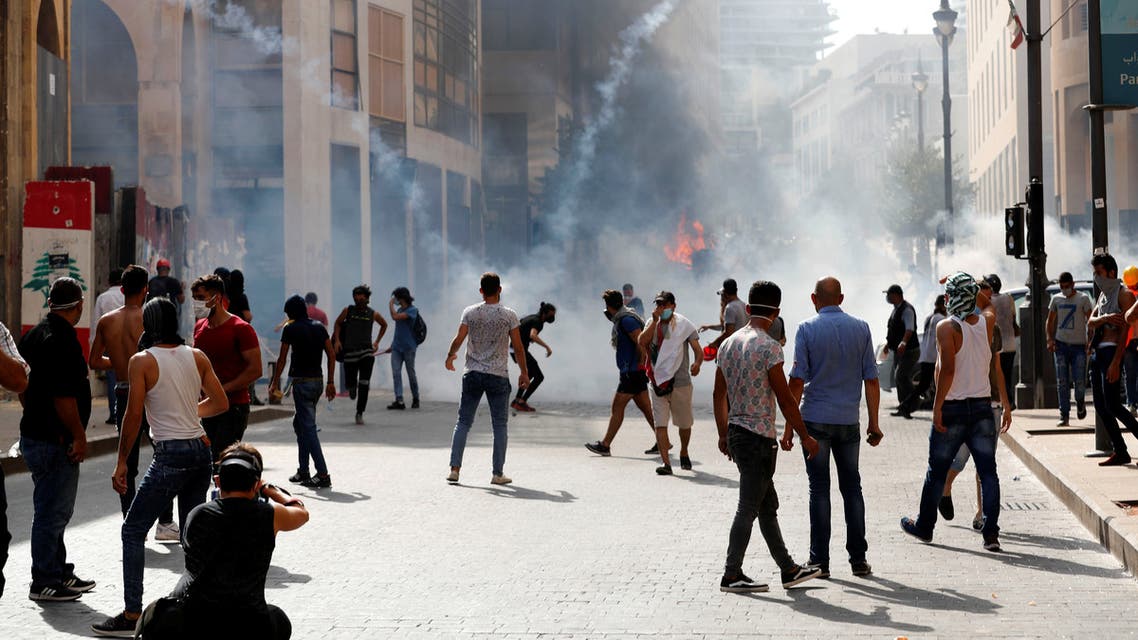 Demonstrators gather as tear gas is fired by security forces during a protest near the parliament following Tuesday's blast, in Beirut, Lebanon August 8, 2020. (Reuters)