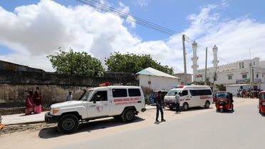 An ambulance is seen near a blast site that rocked a military base in Mogadishu, Somalia, on August 8, 2020. (Reuters)