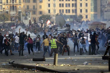 Lebanese protesters clash with security forces in downtown Beirut on August 8, 2020. (AFP)