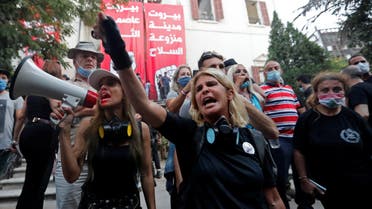 Demonstrators chant slogans outside the premises of the Lebanese foreign ministry during a protest following Tuesday's blast, in Beirut, Lebanon August 8, 2020. (Reuters)