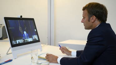 French President Emmanuel Macron attends a donor teleconference with other world leaders, in Bormes-les-Mimosas. (Reuters)