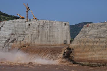 Water flows through Ethiopia's Grand Renaissance Dam as it undergoes construction work on the river Nile in Guba Woreda, Benishangul Gumuz Region, Ethiopia September 26, 2019. Picture taken September 26, 2019. (Reuters)