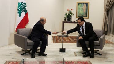 Prime Minister Hassan Diab hands in resignation to President Michel Aoun, Aug. 10, 2020. (Reuters)