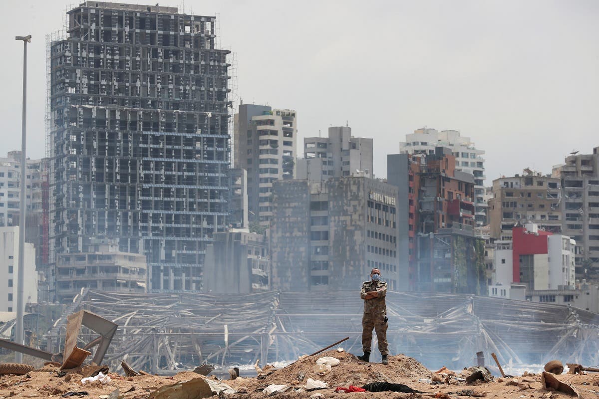 A soldier stands at the devastated site of the explosion at the port of Beirut, Lebanon August 6, 2020. (Reuters)