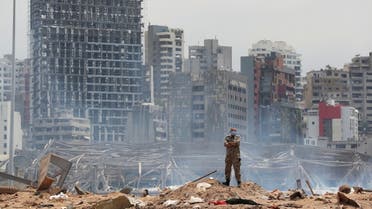 A soldier stands at the devastated site of the explosion at the port of Beirut, Lebanon August 6, 2020. (Reuters)