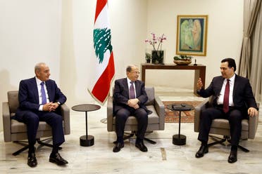 Lebanese President Michel Aoun, center, meets with Prime Minister Hassan Diab, right, and Parliament Speaker Nabih Berri, left, at the Presidential Palace in Baabda, east of Beirut, Lebanon. (AP)