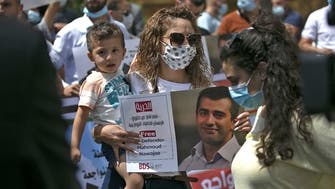 Palestinians protest to demand release of BDS activist arrested for security offenses