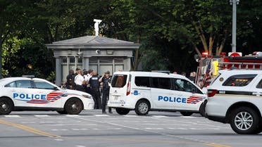 Law enforcement officials gather following a shooting that took place at 17th Street and Pennsylvania Avenue near the White House, on August 10, 2020, in Washington. (AP)