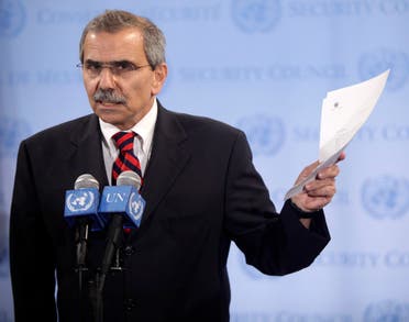 Then-Lebanese Ambassador to the UN Nawaf Salam holds a copy of a letter requesting recognition of Palestinian statehood at UN headquarters, Sept. 23, 2011. (File Photo: AP)