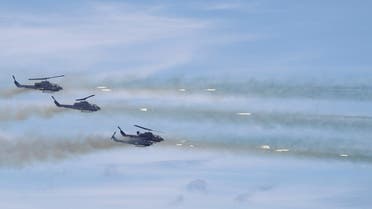AH-64 Apache helicopters fire during the live fire Han Kuang military exercise, which simulates China's People's Liberation Army (PLA) invading the island, in Pingtung. (Reuters)