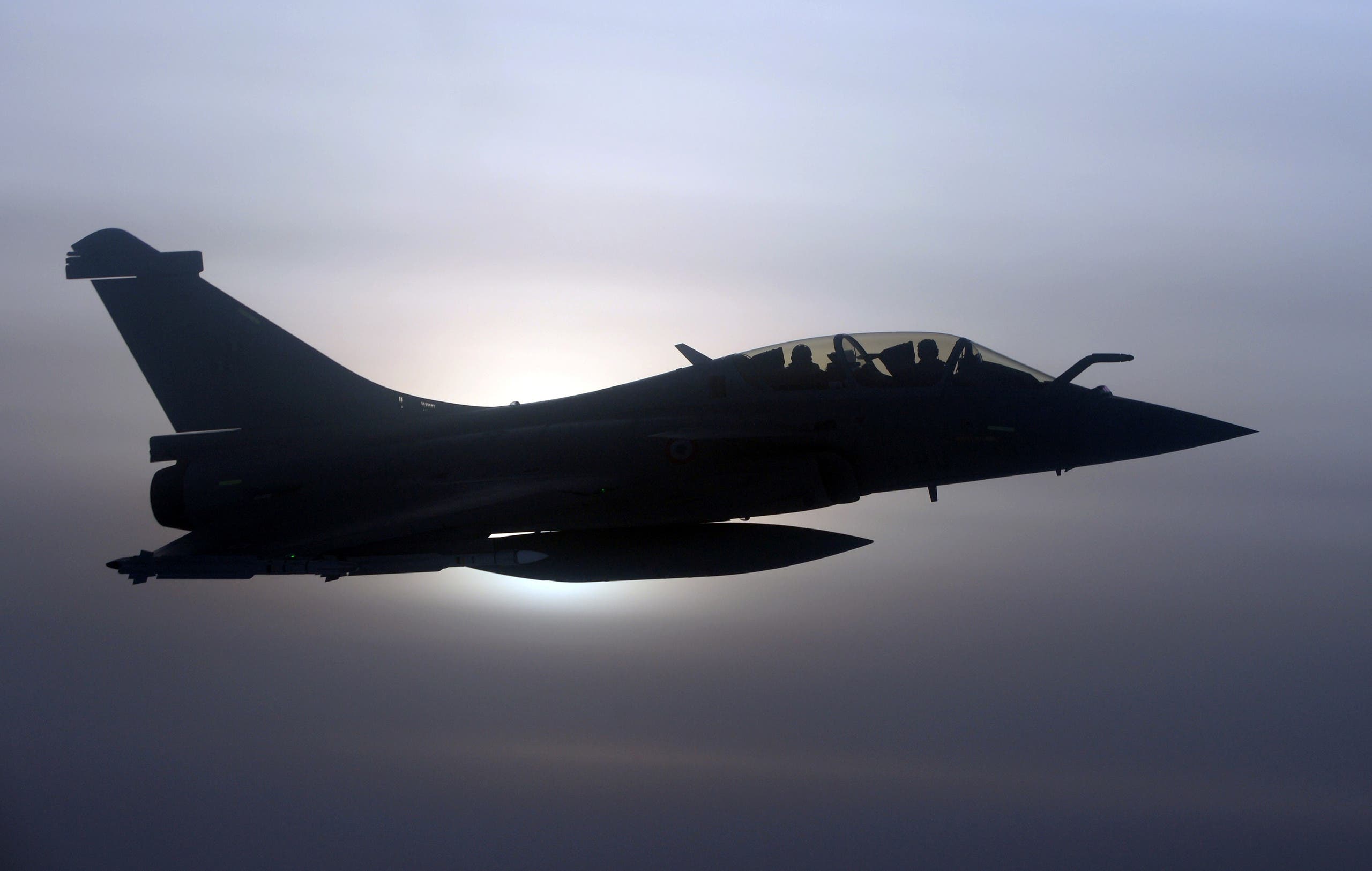 A French Rafale fighter jet demonstrates the interception of a Belgian air force transport plane as they fly over France, January 14, 2020 as part of NATO drills to deter Russian planes from entering allied airspace. Picture taken January 14, 2020. (Reuters)