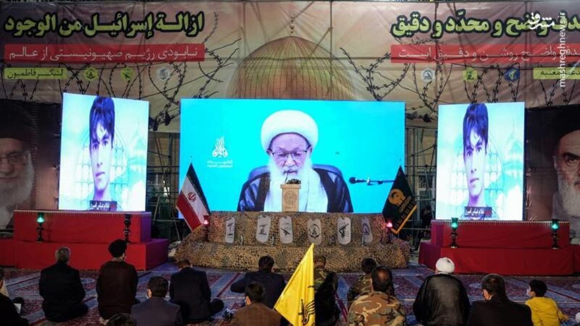 زعيم الميليشيات البحرينية عيسى قاسم متحدثا خلال مؤتمر ميليشيات فاطميون