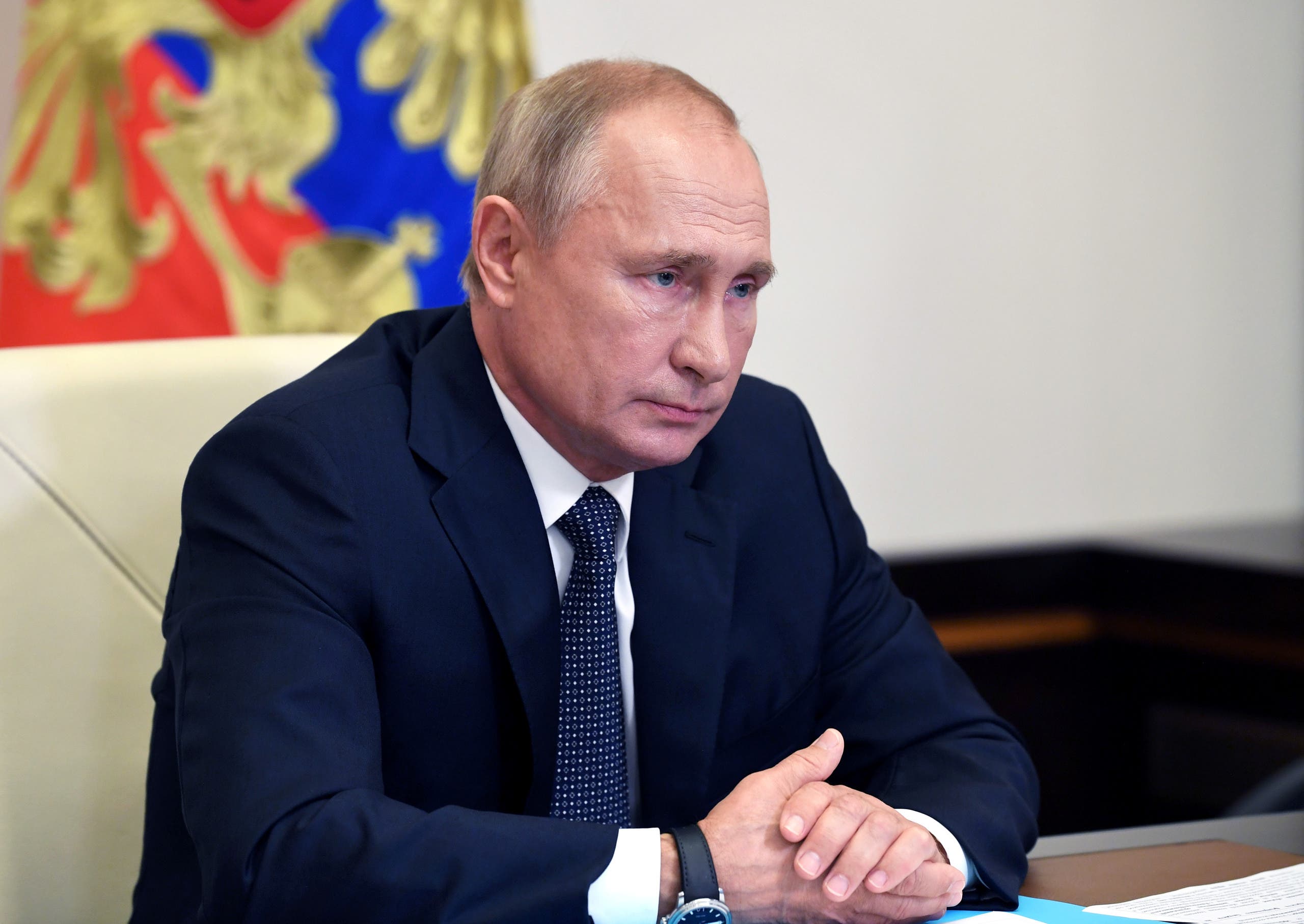 Russian President Vladimir Putin chairs a meeting with members of the government via video link at the Novo-Ogaryovo state residence outside Moscow, Russia August 11, 2020. (Reuters)