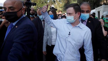 US Under Secretary of State for Political Affairs David Hale thumbs up for volunteers as he visits their main NGOs in Beirut, Aug. 13, 2020. (Reuters)