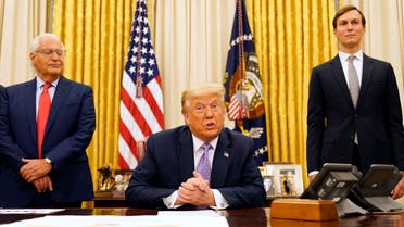 White House Senior Adviser Jared Kushner, right, as US President Donald Trump speaks in the Oval Office on Aug. 13, 2020, in Washington. (AP)
