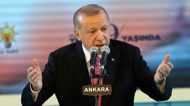 Turkish President and Leader of Turkey's ruling Justice and Development (AK) Party Recep Tayyip Erdogan gestures as he delivers a speech during an event held for the AK Party's 19th foundation anniversary in Ankara, on August 13, 2020. (AFP)