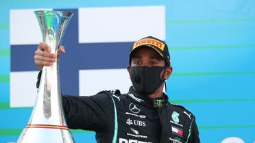 Mercedes’ Lewis Hamilton celebrates on the podium after winning Formula One F1 - Spanish Grand Prix - Circuit de Barcelona-Catalunya, Barcelona, Spain, on August 16, 2020.  (Reuters)