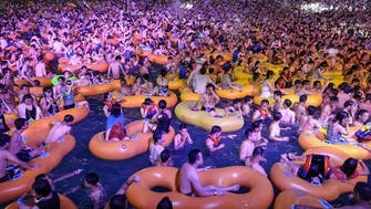 Coronavirus: Partygoers crowd Wuhan water park as life goes back to normal