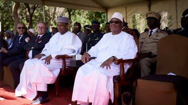 Malian President Ibrahim Boubacar Keita (R) and Malian Prime Minister Boubou Cisse (L) attend the opening of the 12th edition of the Bamako Encounters Photography Biennial. (File photo: AFP)