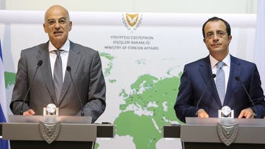 Greek FM Nikos Dendias speaks next to Cypriot FM Nikos Christodoulides (R) during a news conference at the Foreign Ministry in Nicosia, Cyprus, August 18, 2020. (Reuters)