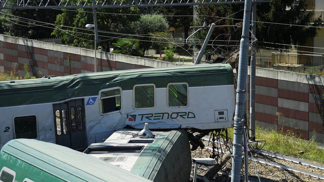 Train carriages are pictured at the scene where a train derailed in Carnate, Italy August 19, 2020. (Reuters)