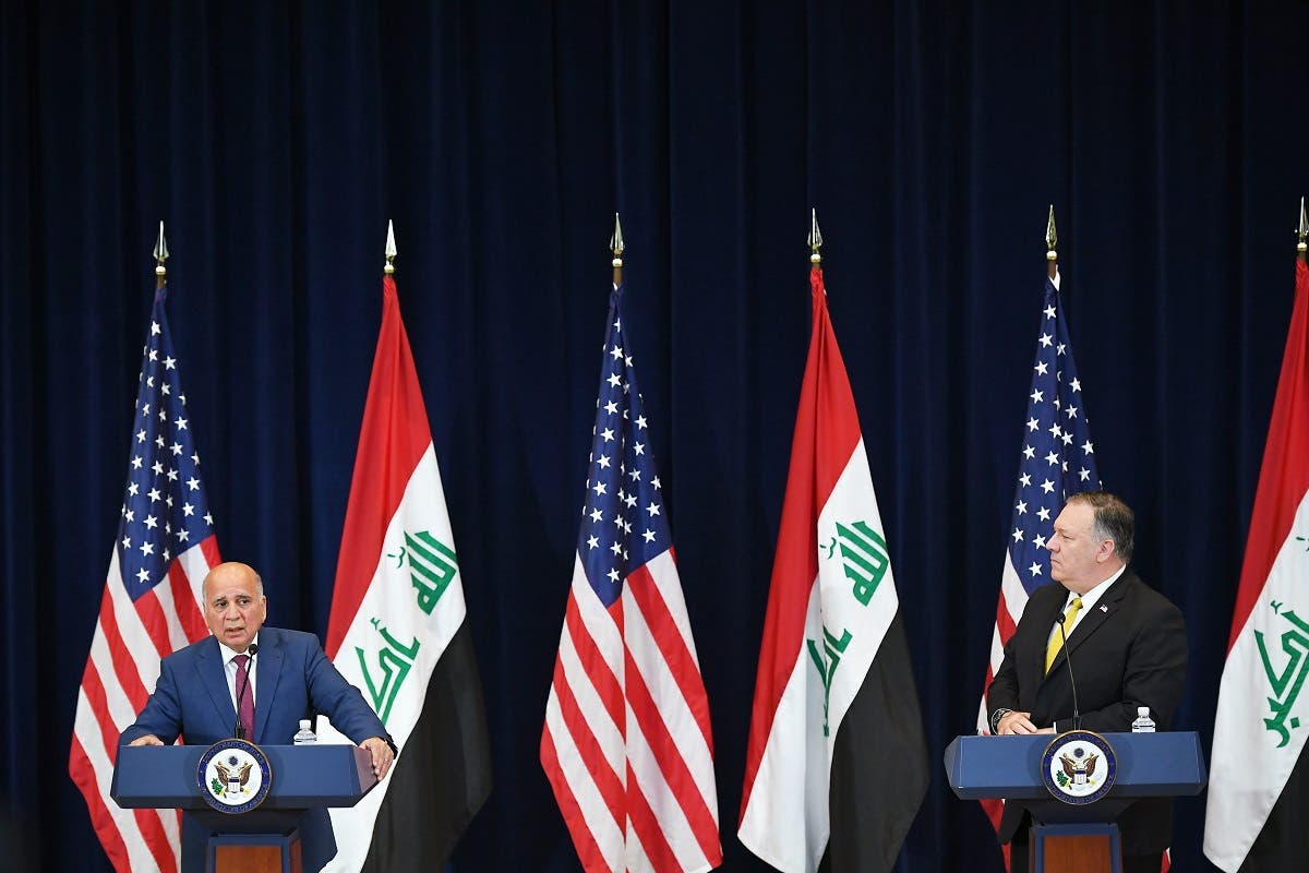Iraq's Foreign Minister Fuad Hussein (L) speaks during a press conference with US Secretary of State Michael Pompeo at the State Department, Aug. 19, 2020. (AFP)