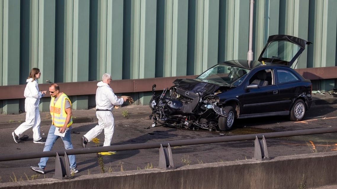 The site where a motorcycle crashed with a car, probably the car used by an alleged offender to cause several accidents on the A 100 highway in Berlin on August 19, 2020. (AFP)