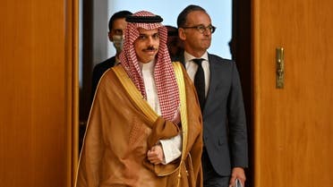 German Foreign Minister Heiko Maas and Saudi Foreign Minister Prince Faisal bin Farhan arrive for a joint news conference in Berlin. (Reuters)