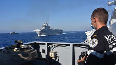 The French Tonnerre helicopter carrier, center, escorted by Greek and French military vessels during a maritime exercise in the Eastern Mediterranean, Thursday, Aug. 13, 2020. (AP)