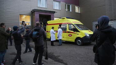 An ambulance is parked at the Omsk Ambulance Hospital No. 1 to pick up Alexei Navalny to the airport in Omsk, Russia, Saturday, Aug. 22, 2020. 