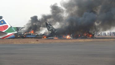A file photo made available by UNMISS, united Nations Mission South Sudan, on March 20, 2017 shows a plane in flames after it crashed along the runway at Wau Airport, northern South Sudan. (AFP)