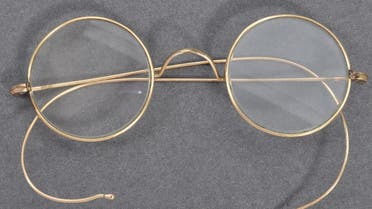 a pair of glasses that once belonged to Indian independence icon Mahatma Gandhi. (AFP)