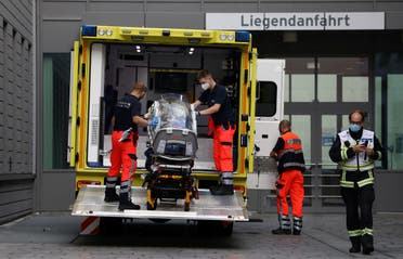 Paramedics load a stretcher into an ambulance that allegedly transported Russian opposition leader Alexei Navalny at Charite Mitte Hospital Complex where he will receive medical treatment in Berlin, Germany August 22, 2020. (Reuters)