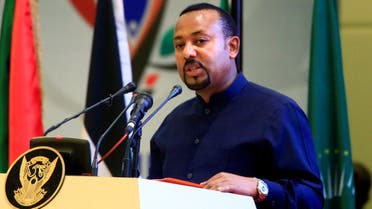 Ethiopia's Prime Minister Abiy Ahmed addresses delegates during the signing of the Sudan's power sharing deal, that paves the way for a transitional government, and eventual elections, following the overthrow of a long-time leader Omar al-Bashir, in Khartoum, Sudan, August 17, 2019. REUTERS/Mohamed Nureldin Abdallah