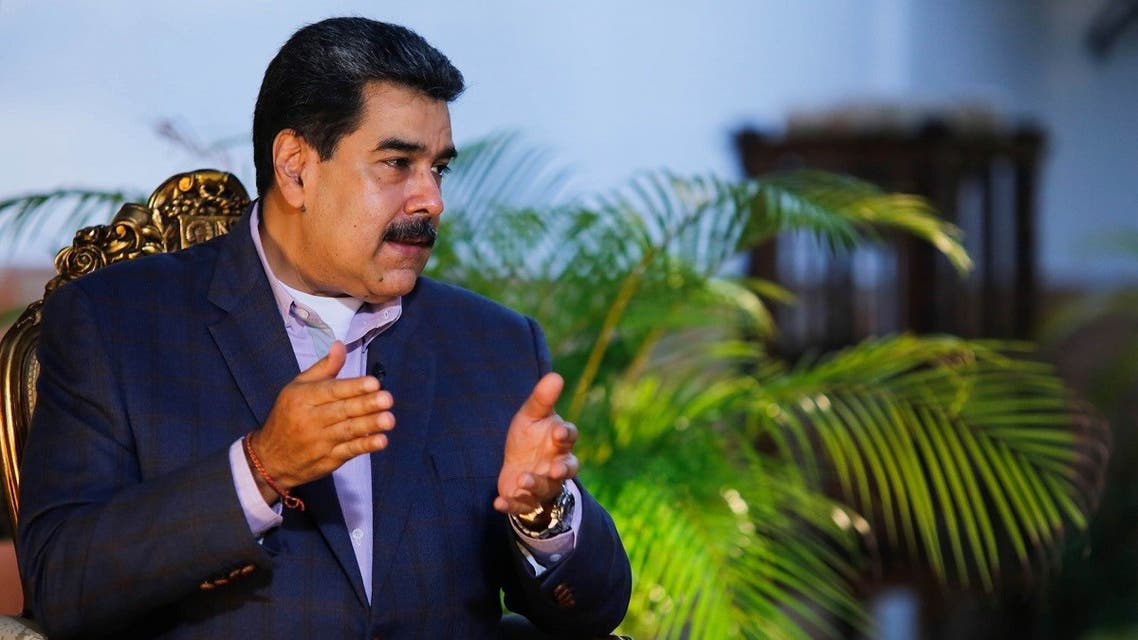 Handout picture released by the Venezuelan Presidency showing President Maduro during an interview with the Venezuelan journalist Ernesto Villegas, in Caracas, August 23, 2020. (AFP/Venezuela’s Presidency/Jhonn Zerpa)