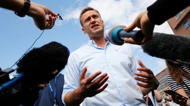 (FILES) In this file photo taken on July 20, 2019 Russian opposition leader Alexei Navalny speaks with journalists during a rally to support opposition and independent candidates after authorities refused to register them for September elections to the Moscow City Duma, Moscow. The Russian opposition leader Alexei Navalny was in intensive care in a Siberian hospital on August 20, 2020 after he fell ill in what his spokeswoman said was a suspected poisoning.