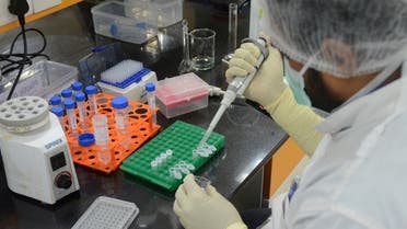 A research scientist works inside a laboratory of India's Serum Institute, the world's largest maker of vaccines, which is working on vaccines against the coronavirus disease (COVID-19) in Pune. (Reuters)
