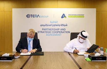 Emirati company APEX National Investment (R) and the Israeli TeraGroup, signing an agreement to develop research on the novel coronavirus, in the Emirati capital Abu Dhabi. (WAM)