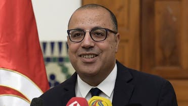 Tunisia's Prime Minister-designate Hichem Mechichi briefs the media about his proposed government list, Aug. 10, 2020. (AFP)