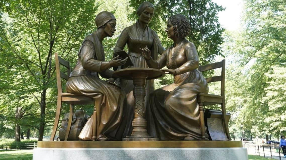 The unveiling of the statue of women's rights pioneers Susan B. Anthony, Elizabeth Cady Stanton and Sojourner Truth is seen in Central Park in New York on August 26, 2020. (AFP)