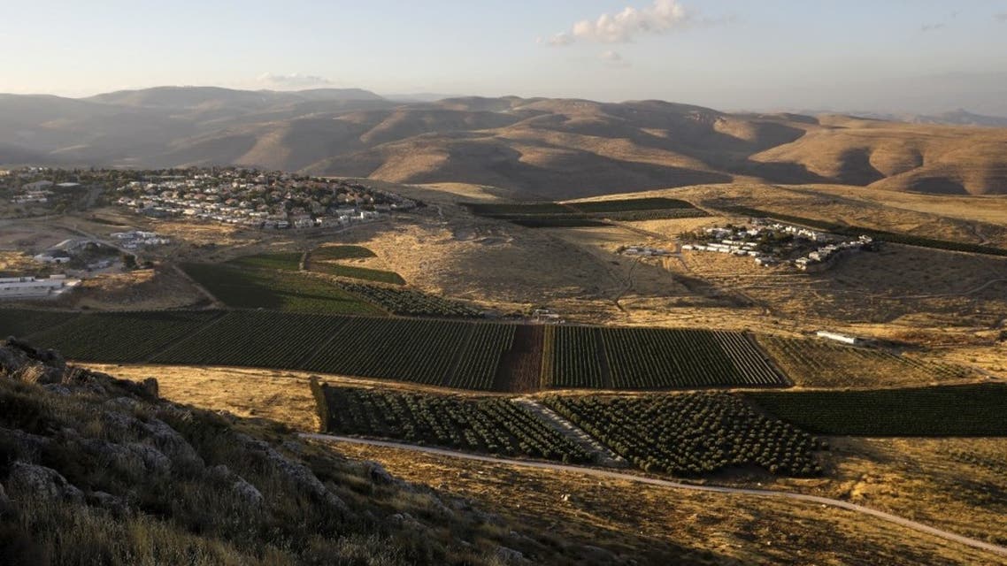 A picture shows the Israeli settlements of Mitzpe Kramim (R) and Kokhav HaShahar (l) in the occupied West Bank on June 18, 2020. (AFP)