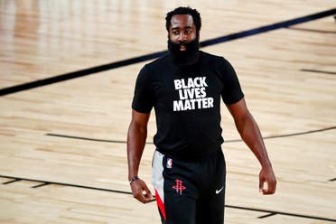 Houston Rockets guard James Harden wears a Black Lives Matter T-shirt during warmups before an NBA game, Aug. 6, 2020, in Florida. (AP)