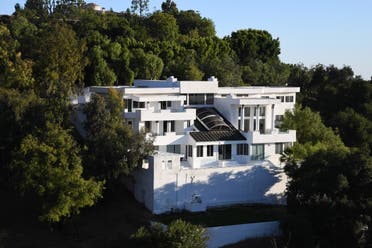 The mansion Palazzo Beverly Hills, where a large party was held in defiance of coronavirus-related health order and ended in a fatal shooting on August 3, is seen on Mulholland drive on August 6, 2020 in Los Angeles, California. (AFP)