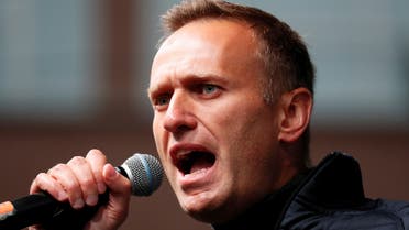 FILE PHOTO: Russian opposition leader Alexei Navalny delivers a speech during a rally to demand the release of jailed protesters, who were detained during opposition demonstrations for fair elections, in Moscow, Russia September 29, 2019. REUTERS/Shamil Zhumatov/File Photo