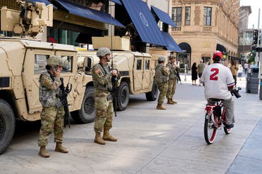 Minnesota National Guard soldiers stand watch along the famous Nicollet Mall, Thursday, Aug. 27, 2020, in downtown Minneapolis. (AP)
