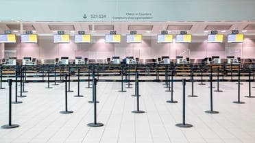 An empty check-in counter is pictured as a Healthy Airport initiative is launched for travel, taking into account social distancing protocols to slow the spread of the coronavirus disease (COVID-19) at Toronto Pearson International Airport. (Reuters)