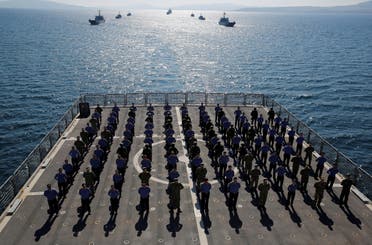 Crew members of the amphibious landing ship tank (LST) TCG Bayraktar (L-402) pose after a landing drill during the Blue Homeland naval exercise off the Aegean coastal town of Foca in Izmir Bay, Turkey. (Reuters)