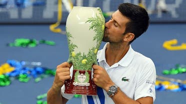 Novak Djokovic (SRB) poses with the trophy following his win over Milos Raonic (CAN) in the Western & Southern Open . (Robert Deutsch/USA TODAY Sports)