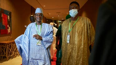 Choguel Maiga (L), a leader of the opposition coalition M5-RFP, arrives at the Sheraton hotel in Bamako on July 23, 2020. (AFP)